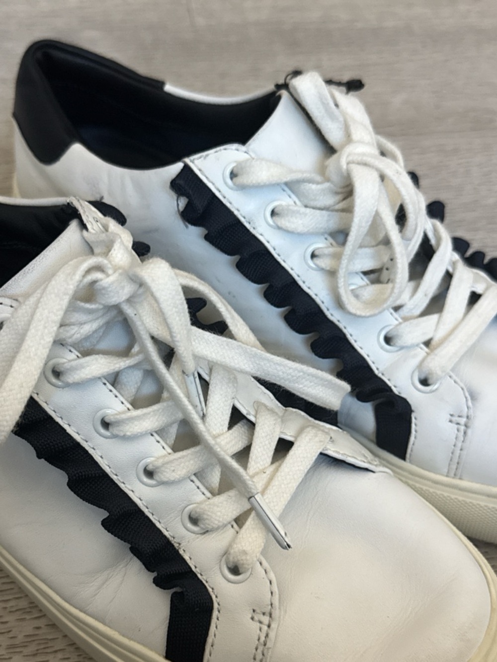 Tory Burch White and Black Ruffle-Trim Leather Sneakers